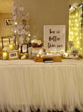 White tulle table skirting